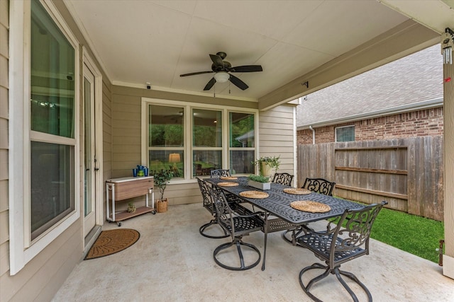 3933 Eagle Nest Lake Ln, Magnolia, TX 77354 - view of patio featuring outdoor dining area and ceiling fan