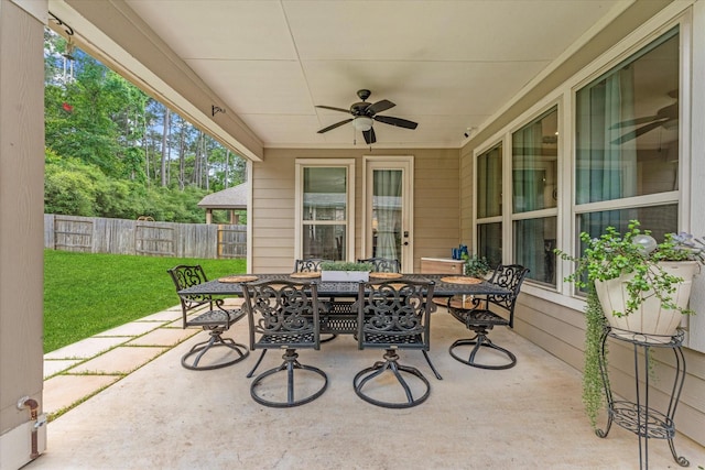 3933 Eagle Nest Lake Ln, Magnolia, TX 77354 - view of patio / terrace with outdoor dining area and a ceiling fan