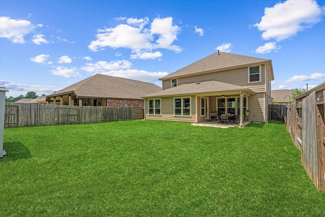 3933 Eagle Nest Lake Ln, Magnolia, TX 77354 - back of house featuring a patio, ceiling fan, and roof with shingles