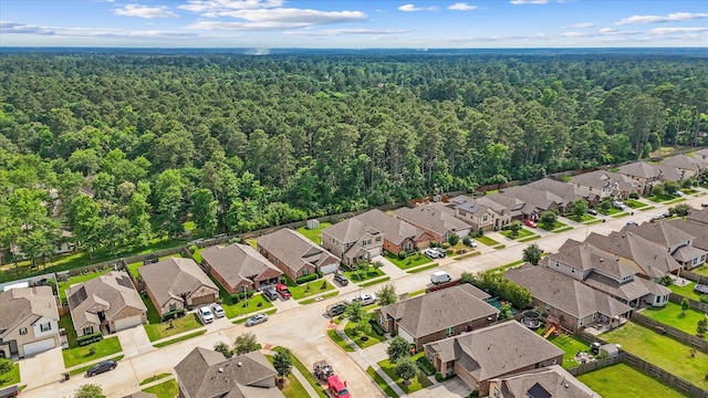 3933 Eagle Nest Lake Ln, Magnolia, TX 77354 - aerial view of residential area with a heavily wooded area