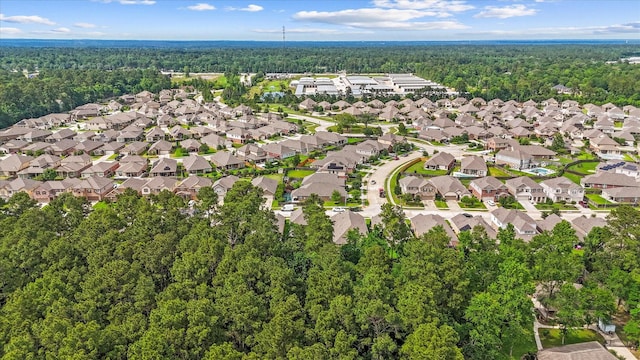 3933 Eagle Nest Lake Ln, Magnolia, TX 77354 - aerial view of property and surrounding area with a heavily wooded area and nearby suburban area