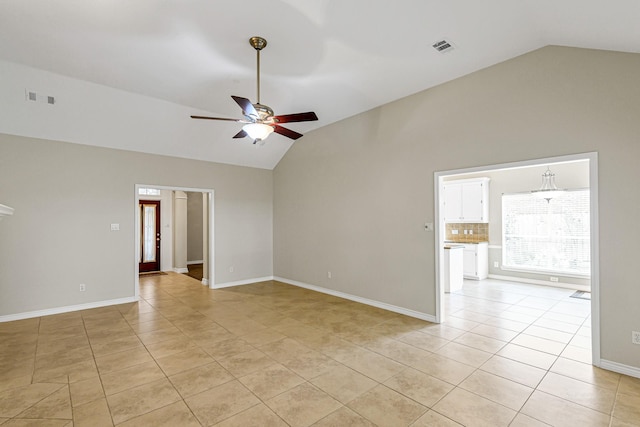 1438 Crescent Green Dr, Houston, TX 77094 - empty room featuring vaulted ceiling, light tile patterned flooring, and a ceiling fan