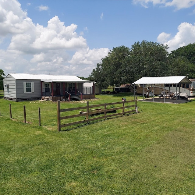 21403 Briar Meadow Rd N, Hempstead, TX 77445 - view of yard featuring a detached carport