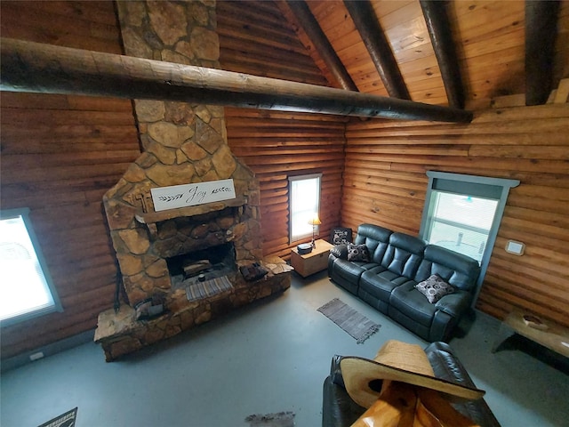 21403 Briar Meadow Rd N, Hempstead, TX 77445 - living room featuring wood ceiling, a fireplace, log walls, healthy amount of natural light, and finished concrete flooring