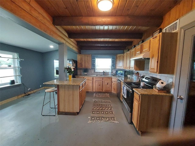 21403 Briar Meadow Rd N, Hempstead, TX 77445 - kitchen featuring appliances with stainless steel finishes, under cabinet range hood, finished concrete floors, a breakfast bar area, and wood ceiling with exposed beams