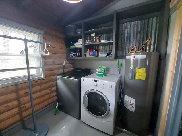 21403 Briar Meadow Rd N, Hempstead, TX 77445 - washroom featuring electric water heater, rustic walls, and separate washer and dryer