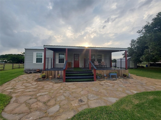 21403 Briar Meadow Rd N, Hempstead, TX 77445 - manufactured / mobile home featuring a porch and metal roof