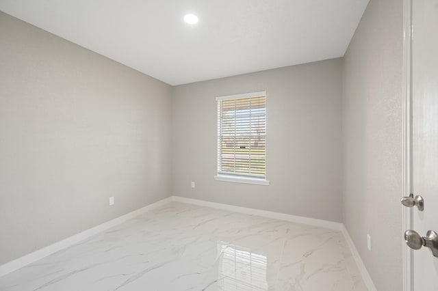 2414 Camillia St, Highlands, TX 77562 - spare room with light marble finish flooring and baseboards