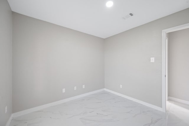 2414 Camillia St, Highlands, TX 77562 - unfurnished room with light marble finish flooring, baseboards, and recessed lighting