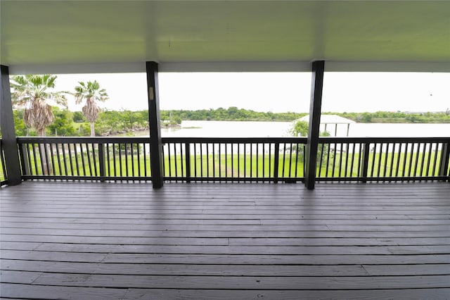 110 Bayou Dr, Baytown, TX 77520 - wooden terrace with a water view