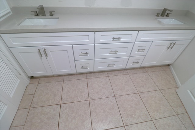 110 Bayou Dr, Baytown, TX 77520 - bathroom featuring a sink and tile patterned floors