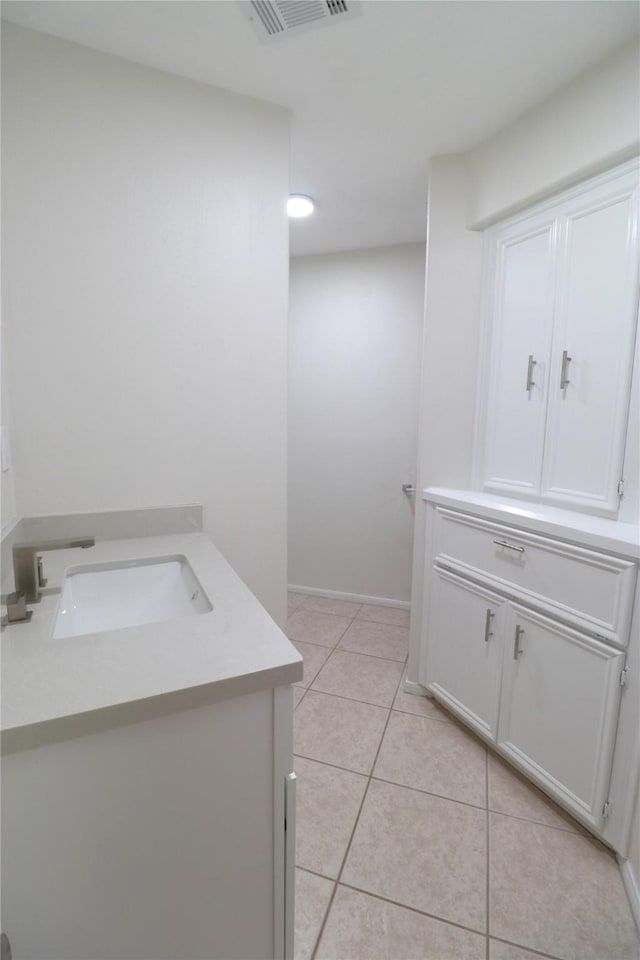 110 Bayou Dr, Baytown, TX 77520 - bathroom featuring tile patterned flooring and vanity