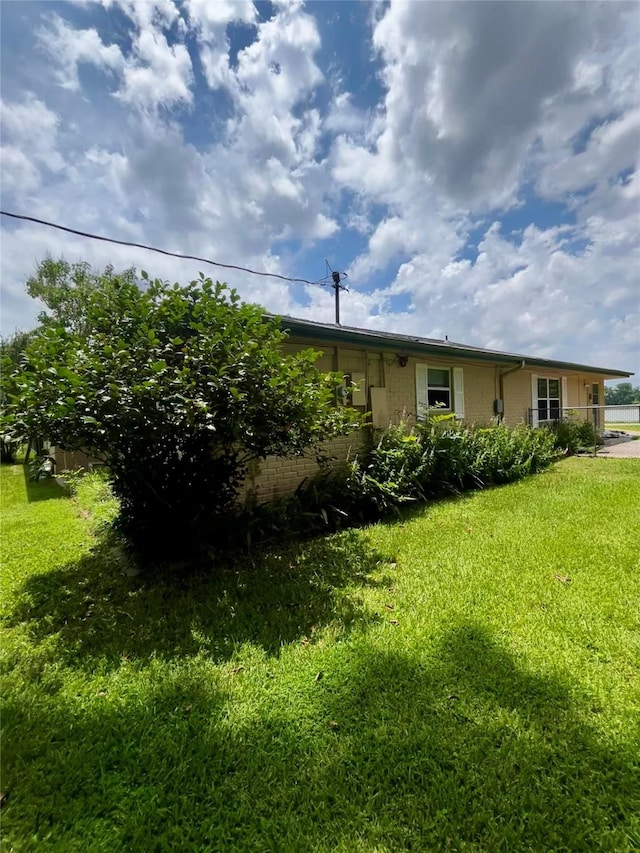125 Mimosa Pt, Livingston, TX 77351 - view of green lawn