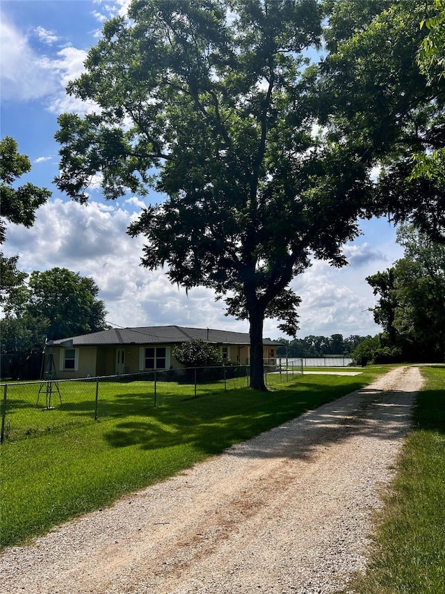 125 Mimosa Pt, Livingston, TX 77351 - view of front of home with driveway