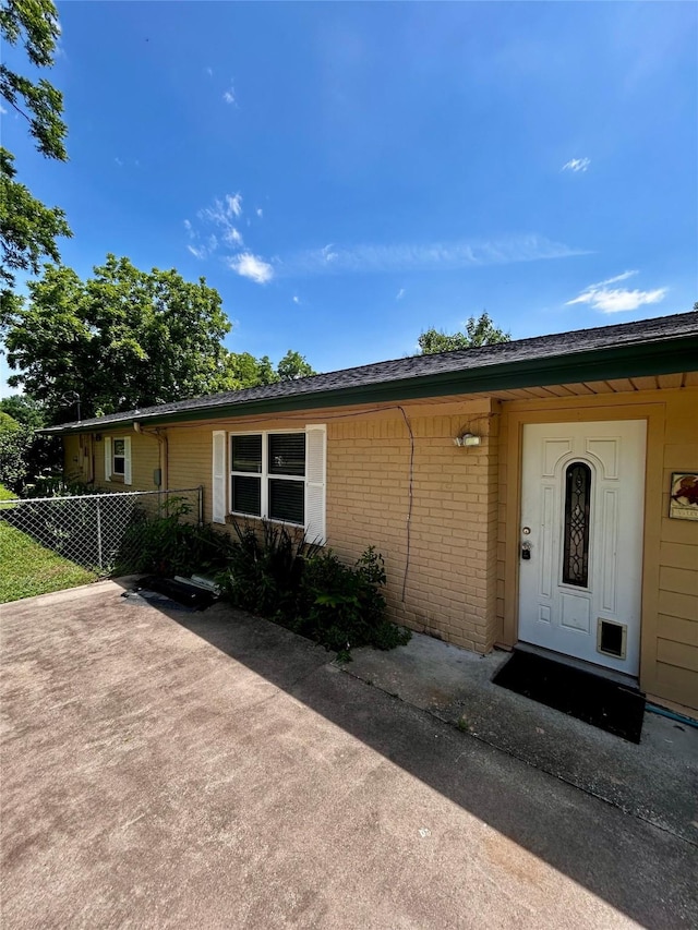 125 Mimosa Pt, Livingston, TX 77351 - view of front of house featuring brick siding