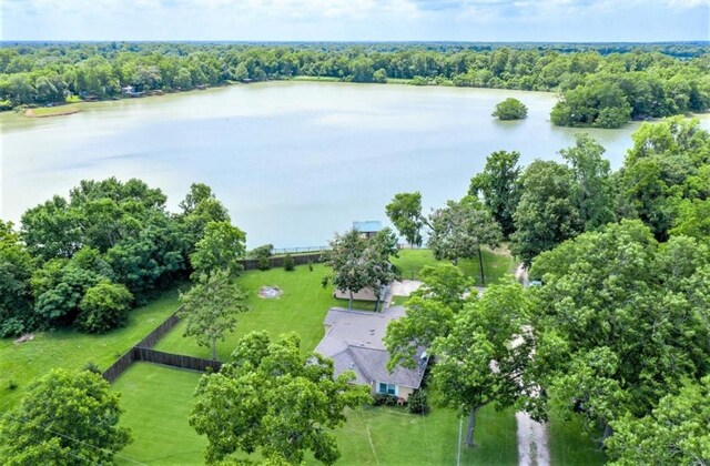 125 Mimosa Pt, Livingston, TX 77351 - drone / aerial view of a nearby body of water and a heavily wooded area