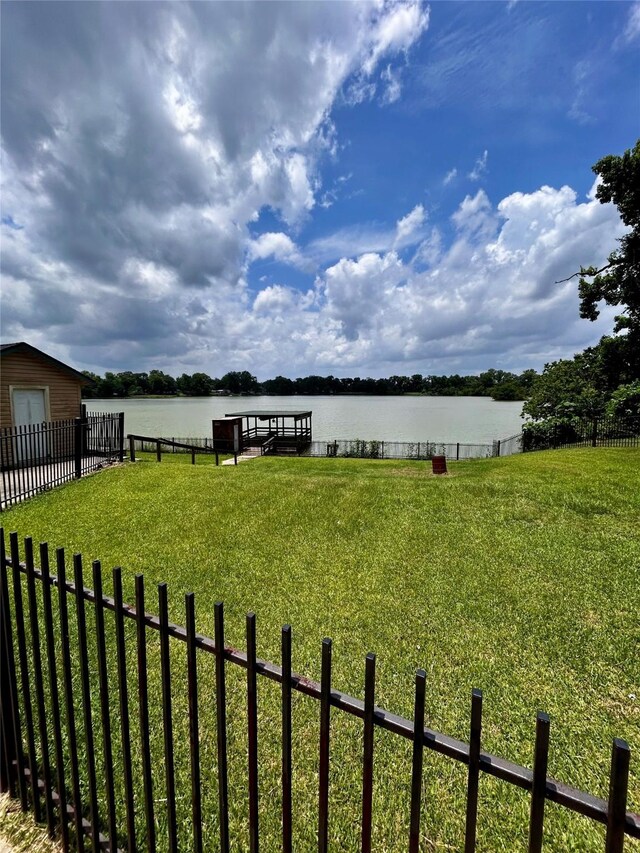 125 Mimosa Pt, Livingston, TX 77351 - view of yard with a water view