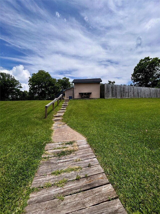 125 Mimosa Pt, Livingston, TX 77351 - view of yard with an outbuilding