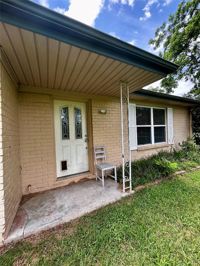 125 Mimosa Pt, Livingston, TX 77351 - property entrance with brick siding