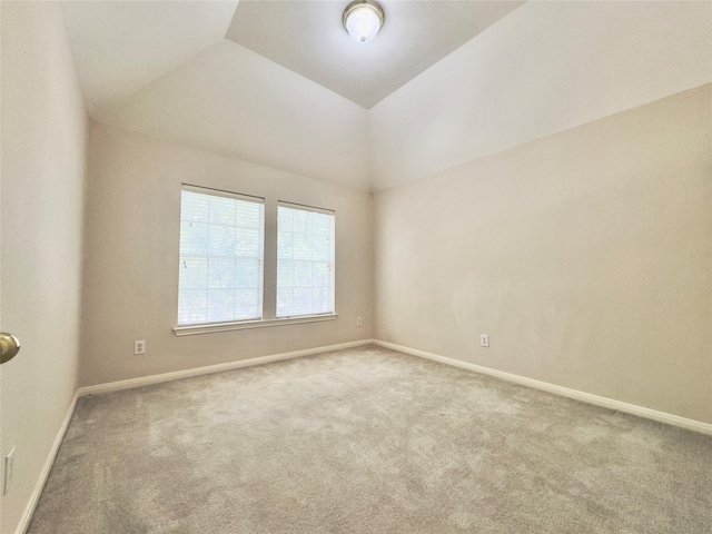 2807 Enchanted Landing Ct, Katy, TX 77494 - empty room with carpet flooring, baseboards, and lofted ceiling