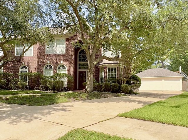 2807 Enchanted Landing Ct, Katy, TX 77494 - colonial inspired home with brick siding and a garage