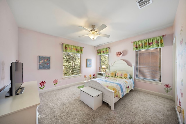 3327 Elmridge St, Houston, TX 77025 - bedroom with carpet flooring, baseboards, and a ceiling fan