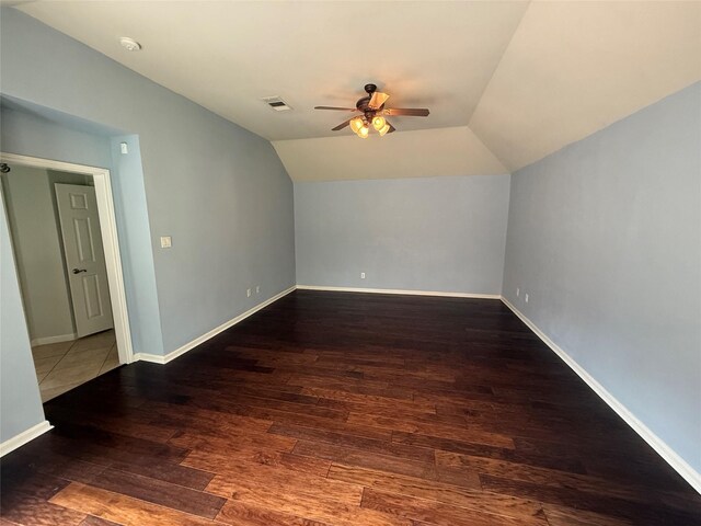 22115 Canyonwood Park Ln, Richmond, TX 77469 - additional living space with ceiling fan, lofted ceiling, wood finished floors, and baseboards
