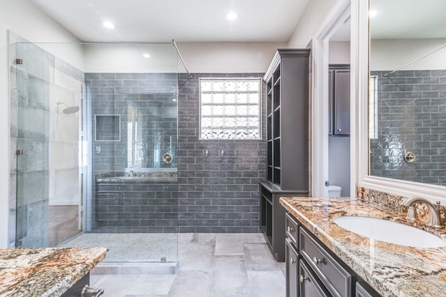 403 Harborside Way, Kemah, TX 77565 - bathroom featuring vanity, a tile shower, toilet, and recessed lighting
