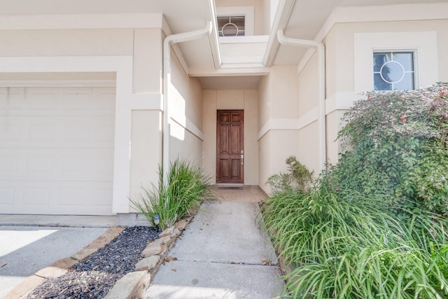 403 Harborside Way, Kemah, TX 77565 - doorway to property with stucco siding