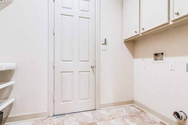 403 Harborside Way, Kemah, TX 77565 - laundry room featuring baseboards, cabinet space, and washer hookup