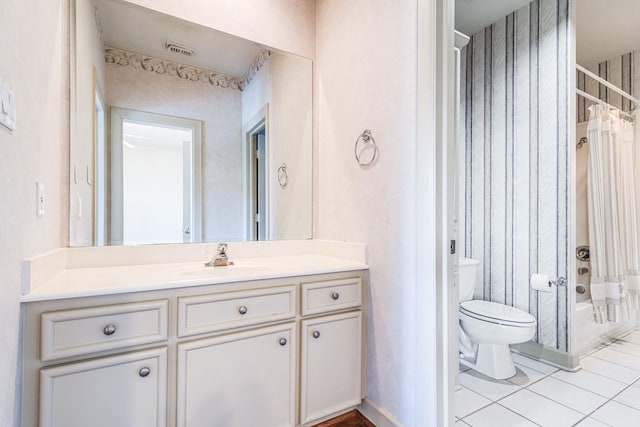 403 Harborside Way, Kemah, TX 77565 - bathroom featuring vanity, toilet, tile patterned floors, and shower / bath combination with curtain