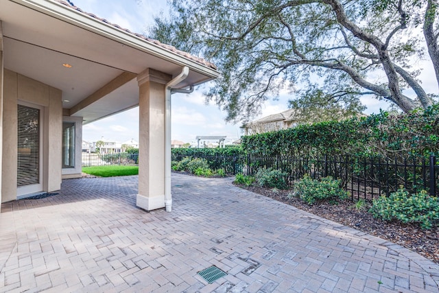 403 Harborside Way, Kemah, TX 77565 - fenced backyard featuring a patio