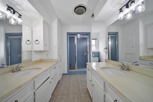 6803 Shady Ln, Richmond, TX 77406 - full bath featuring a stall shower and two vanities