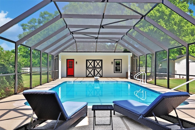 6803 Shady Ln, Richmond, TX 77406 - swimming pool featuring a lanai, a patio, and a lawn