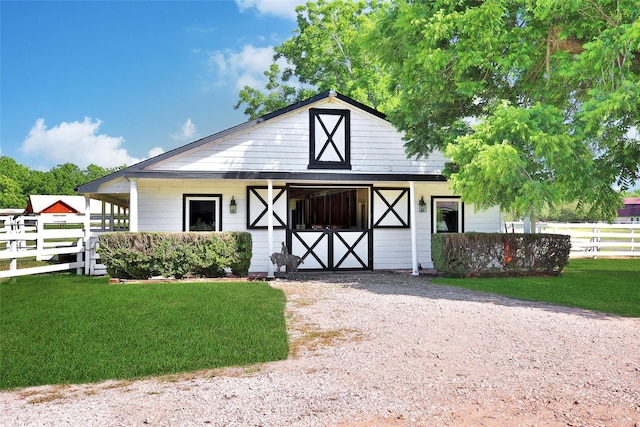6803 Shady Ln, Richmond, TX 77406 - view of front of home featuring an outbuilding, a barn, and an exterior structure