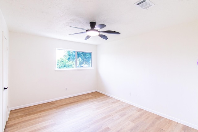 12419 Huntington Field Dr, Houston, TX 77099 - spare room with light wood finished floors, baseboards, and ceiling fan