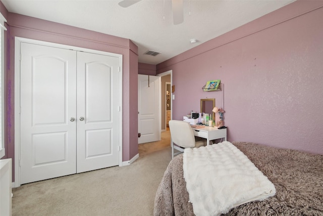 15603 Clearwater Bend Dr, Houston, TX 77044 - bedroom featuring light colored carpet, a closet, and ceiling fan