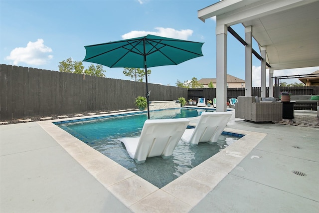 15603 Clearwater Bend Dr, Houston, TX 77044 - view of swimming pool featuring a fenced backyard, a patio, and an outdoor living space