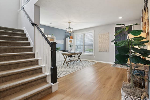 15603 Clearwater Bend Dr, Houston, TX 77044 - foyer featuring wood finished floors, stairway, baseboards, and recessed lighting