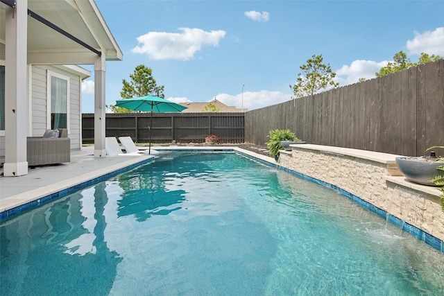 15603 Clearwater Bend Dr, Houston, TX 77044 - view of swimming pool featuring a fenced backyard and a patio area