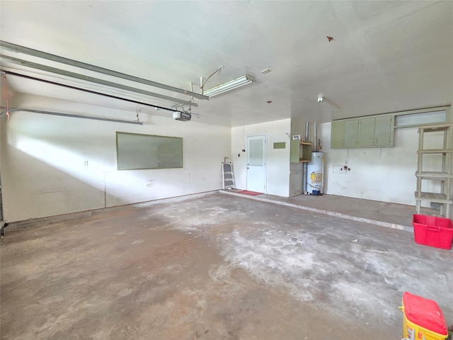 11902 25th St, Santa Fe, TX 77510 - garage featuring gas water heater and a garage door opener
