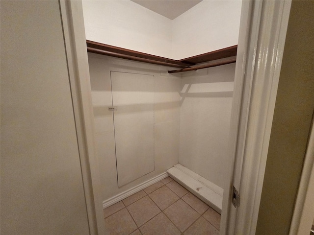 11902 25th St, Santa Fe, TX 77510 - walk in closet with light tile patterned floors