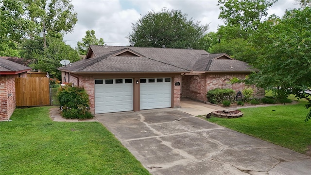 11902 25th St, Santa Fe, TX 77510 - ranch-style house with brick siding, a shingled roof, an attached garage, and concrete driveway