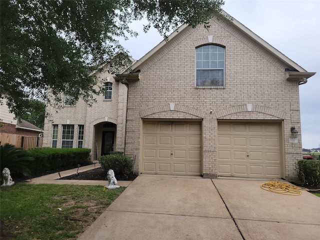 5647 Horseshoe Fls, Missouri City, TX 77459 - french country home with a garage, driveway, and brick siding