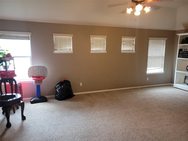 5647 Horseshoe Fls, Missouri City, TX 77459 - living area featuring a ceiling fan, carpet flooring, baseboards, and healthy amount of natural light
