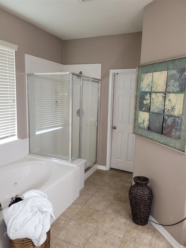 5647 Horseshoe Fls, Missouri City, TX 77459 - full bath featuring a stall shower, a whirlpool tub, and tile patterned flooring