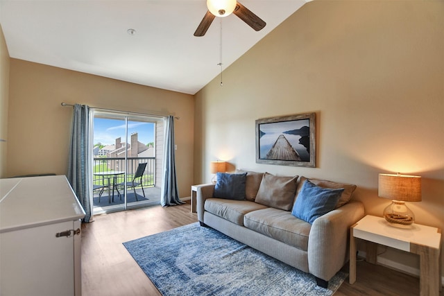 12800 Melville Dr Unit B302, Montgomery, TX 77356 - living room with wood finished floors, a ceiling fan, and vaulted ceiling
