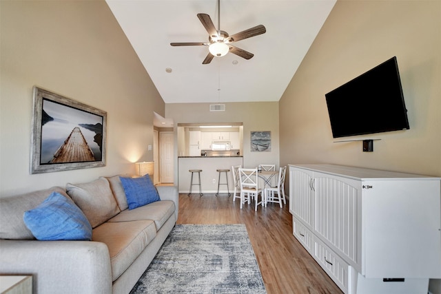 12800 Melville Dr Unit B302, Montgomery, TX 77356 - living room with a ceiling fan, high vaulted ceiling, and wood finished floors