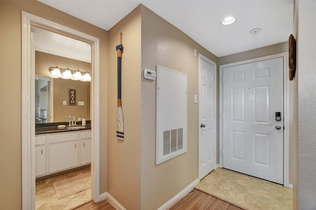 12800 Melville Dr Unit B302, Montgomery, TX 77356 - entrance foyer with light tile patterned flooring and baseboards
