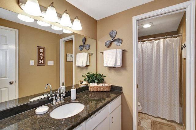 12800 Melville Dr Unit B302, Montgomery, TX 77356 - bathroom with vanity, tile patterned floors, toilet, and a shower with curtain